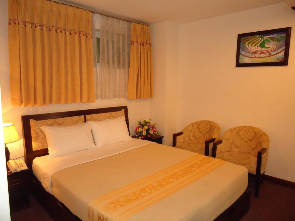 Dong Kinh Hotel Cidade de Ho Chi Minh Quarto foto